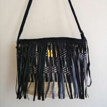 Monochrome Fringed Kiondo Sling - Okapu is a social enterprise making kiondos great. African bags handmade in Kenya with love for gifting and for elevating your fashion style.
