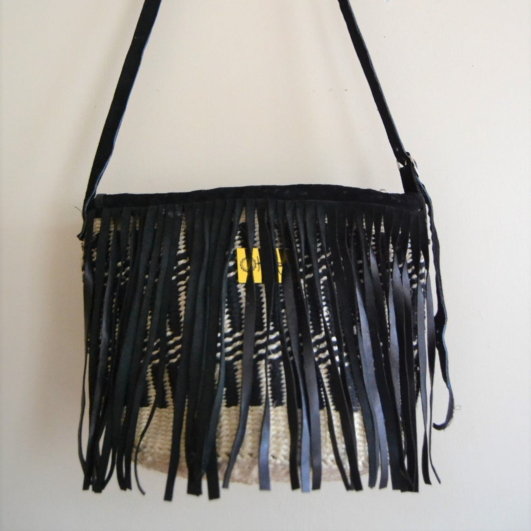 Monochrome Fringed Kiondo Sling - Okapu is a social enterprise making kiondos great. African bags handmade in Kenya with love for gifting and for elevating your fashion style.